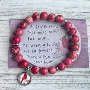 Elegant Red Beaded Bracelet with Cardinal Charm
